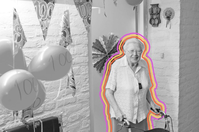 An elderly woman at her 100th birthday party