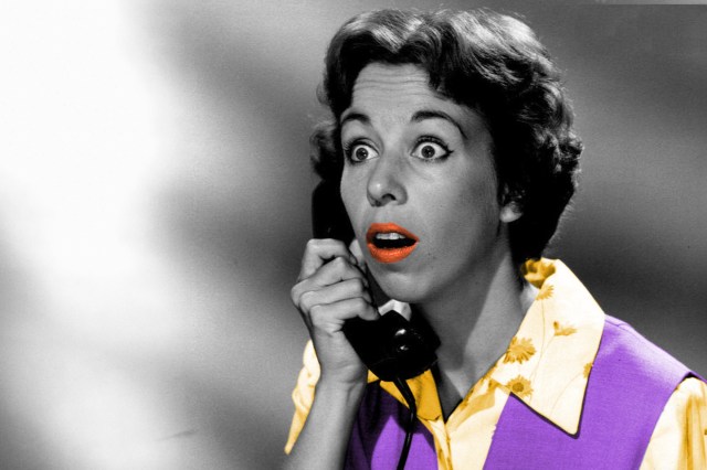 Carol Burnett holding a telephone to her ear