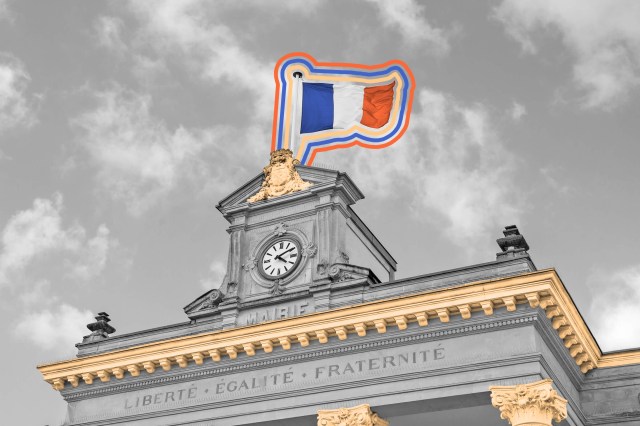 French flag with a clock on top of a building