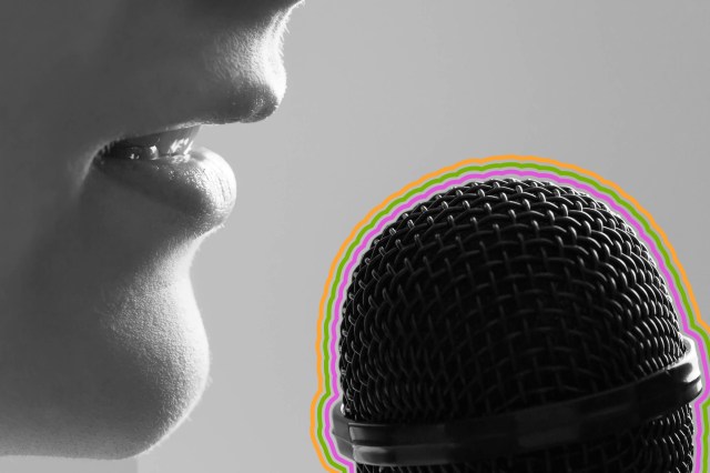 Closeup of a mouth speaking into a microphone