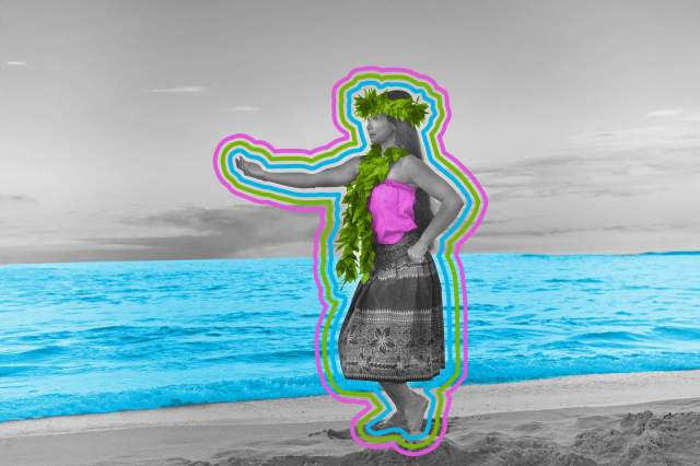 Hawaiian hula dancer dancing on the beach of the tropical Hawaiian islands