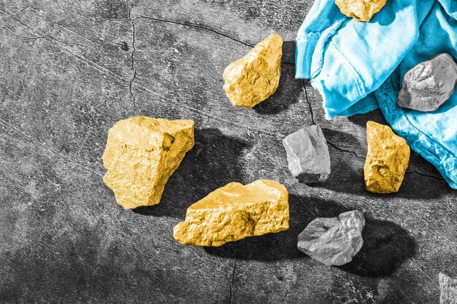 Nuggets of gold scattered across a surface