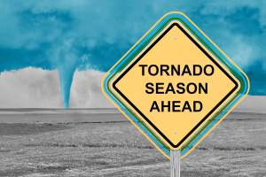 Tornado Season Ahead caution sign with tornado background